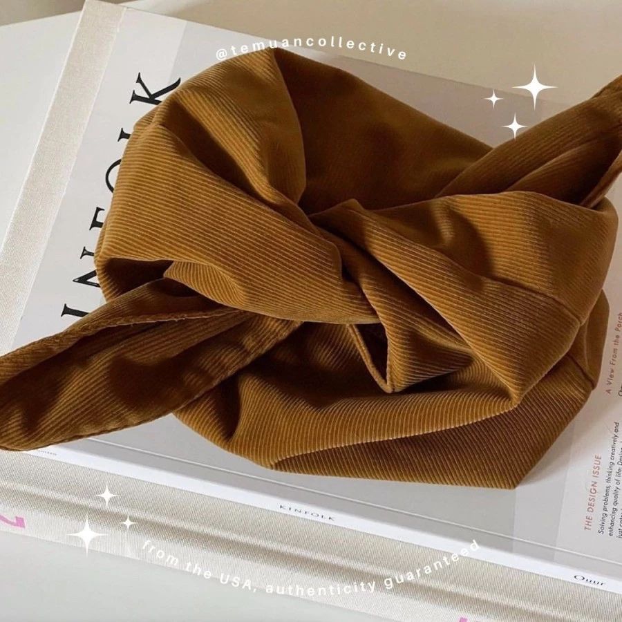 MERIT Beauty Knotted Signature Bag / Brandon Maxwell